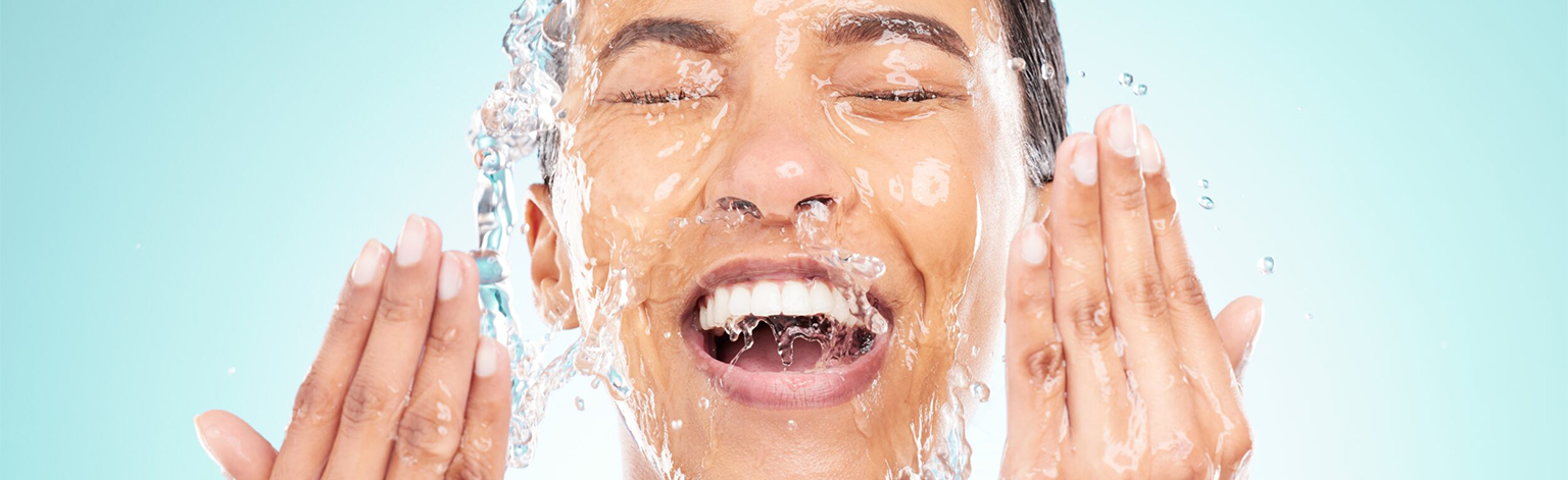 Skincare,,Water,And,Woman,Washing,Face,In,Studio,For,Wellness,